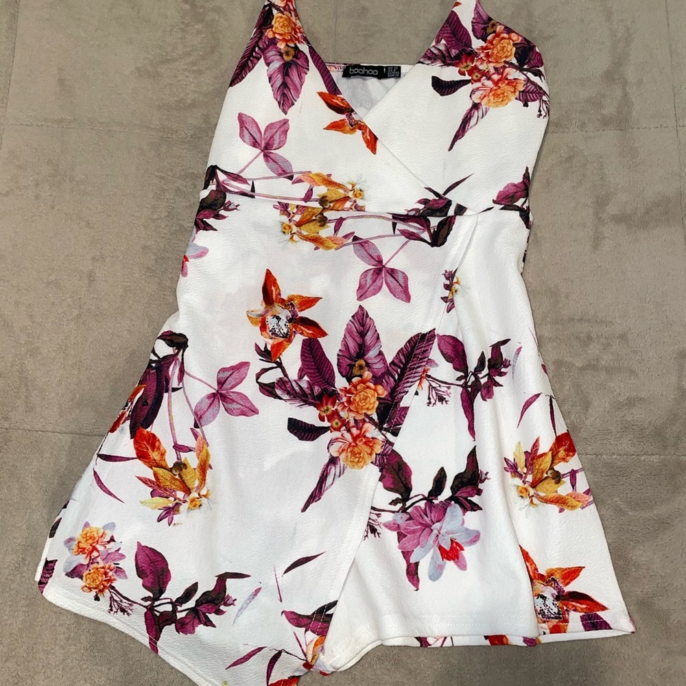 White floral romper with envelope skirt style